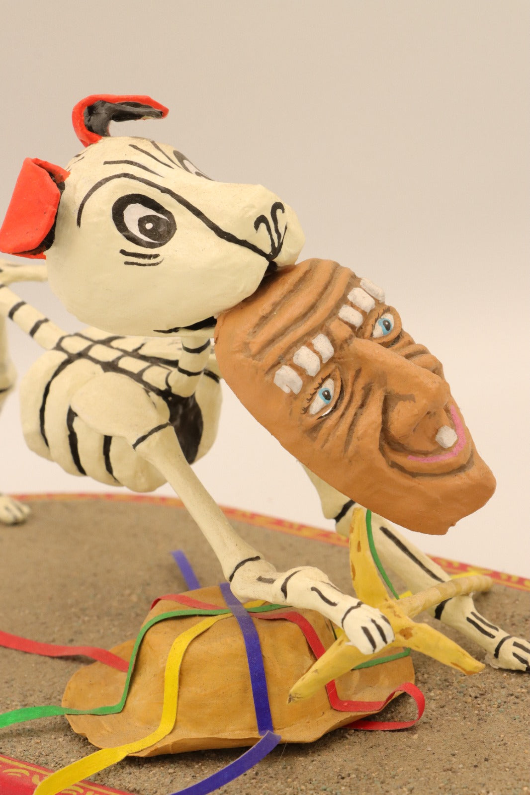 Skeleton puppy with old man mask