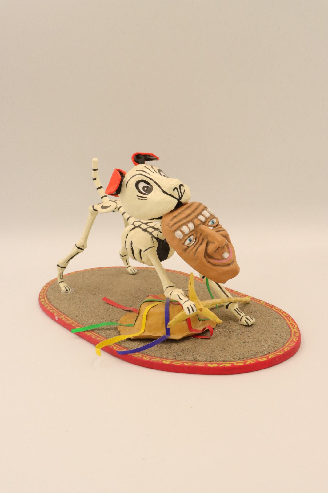 Skeleton puppy with old man mask